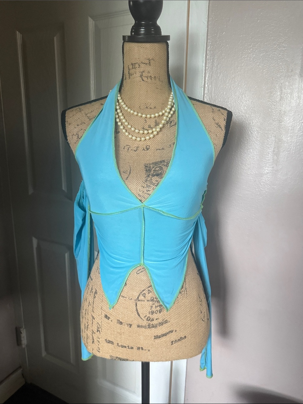 PrettyLittleThing Bright Aqua Halter Pointed Hem Crop Top